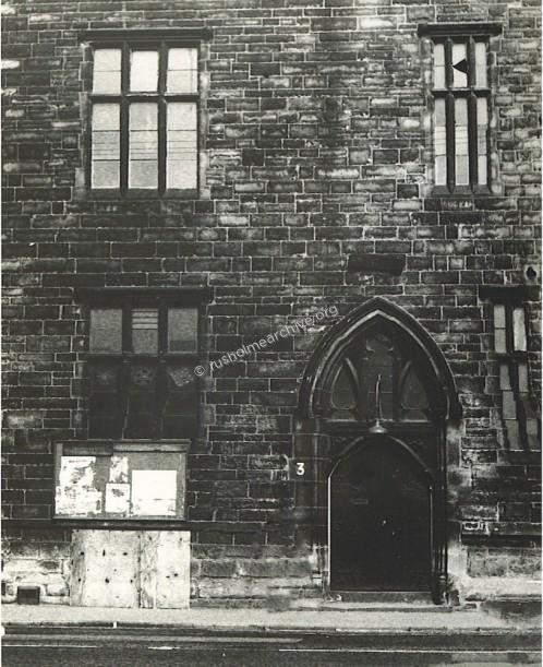 A sooty frontage of the Hall