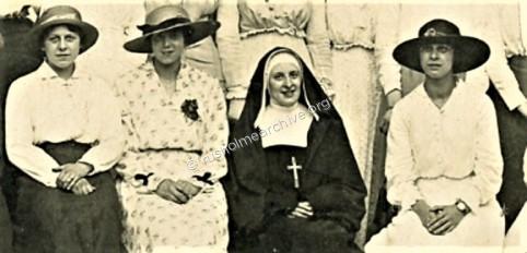 A smiling Nun amongst 'fallen women'